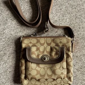 Brown/tan Coach crossbody purse